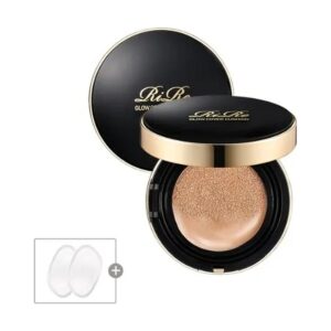 RiRe Glow Cover Cushion black and gold compact, open to show beige cushion, with two spare puffs