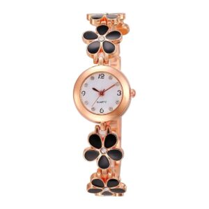 Rose-gold tone bracelet watch with black daisy-shaped links, rhinestone centres and a small white dial